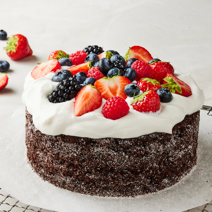 Moist dark soft cake with vegan cream